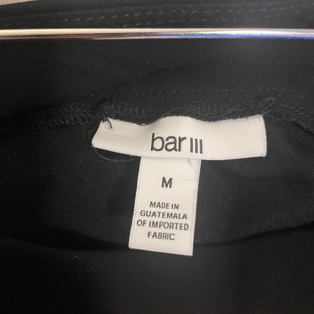 Bar III black ankle length pants. Fringe bottom pant leg w/decorative buttons. - Picture 5 of 6